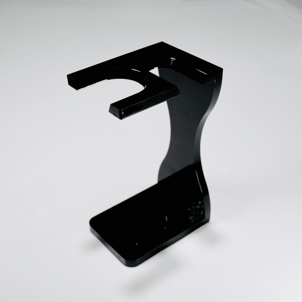 Image of Stuga's handmade Acrylic Noir Grooming Shaving Kit Stand, showcasing sleek, sustainable design for organized shaving essentials.
