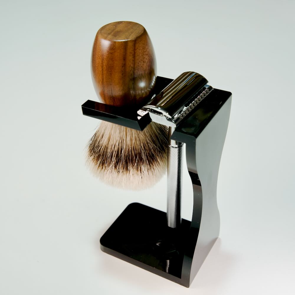 Image of Stuga's Acrylic Noir Grooming Shaving Kit Stand, a sleek, handcrafted display for organizing shaving tools sustainably.