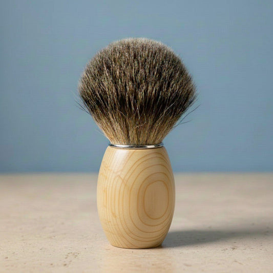 3rd grade badger bristle shaving brush with light-colored huon pine wood handle and silver ferrule