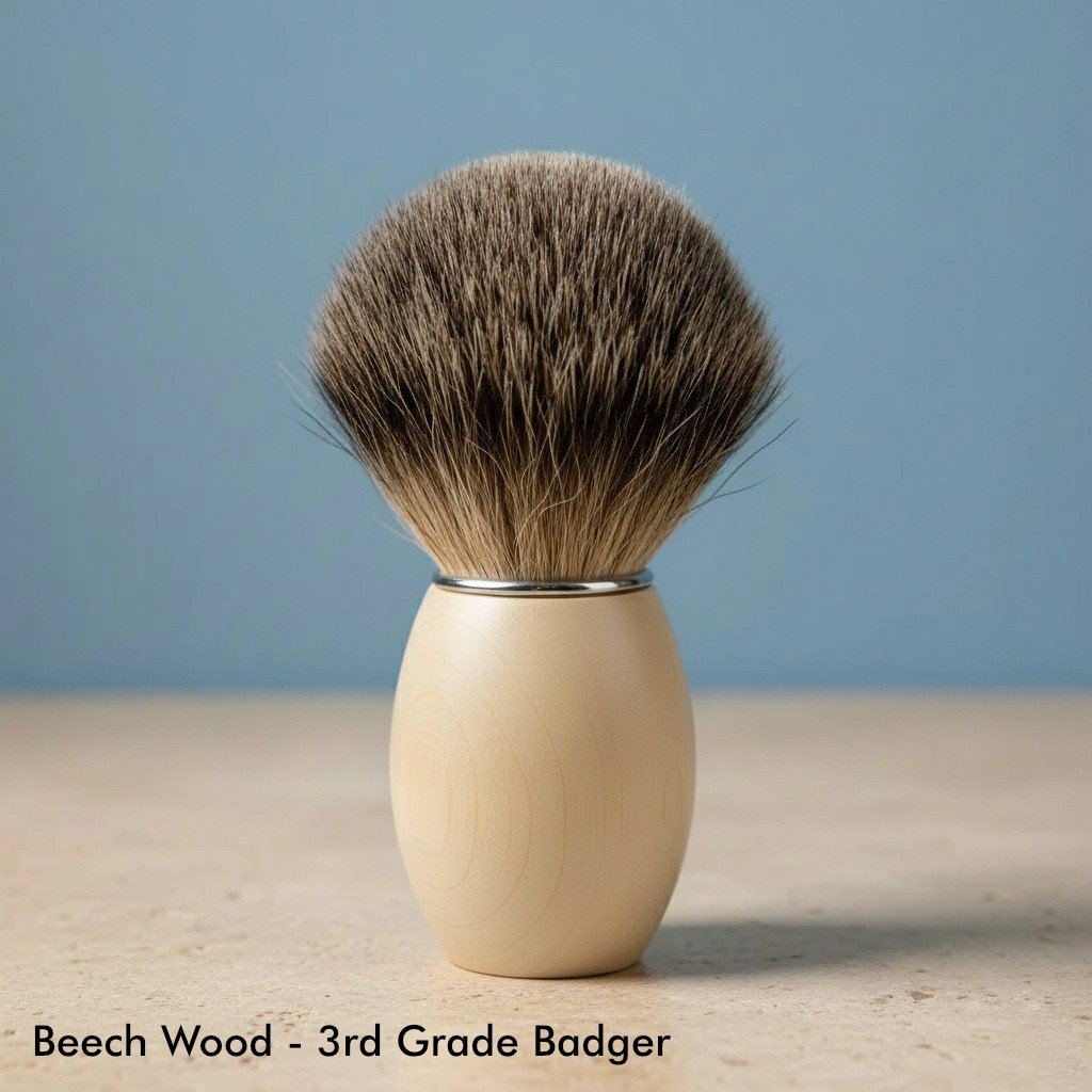Close-up of a shaving brush with a light-colored, smooth beech wood handle and soft, dark brown 3rd grade badger bristles.