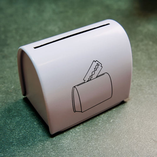 Handcrafted Stuga Razor Blade Disposal Case, sustainable Australian design, securely stores used blades discreetly.