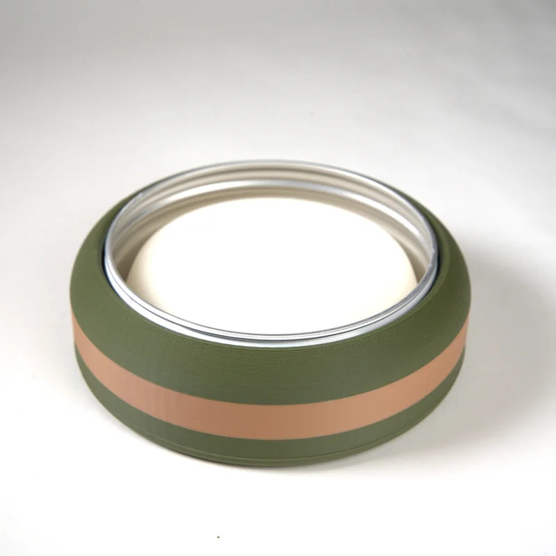 Round green pet water bowl with brown stripe and stainless steel inner lining for durable pet hydration