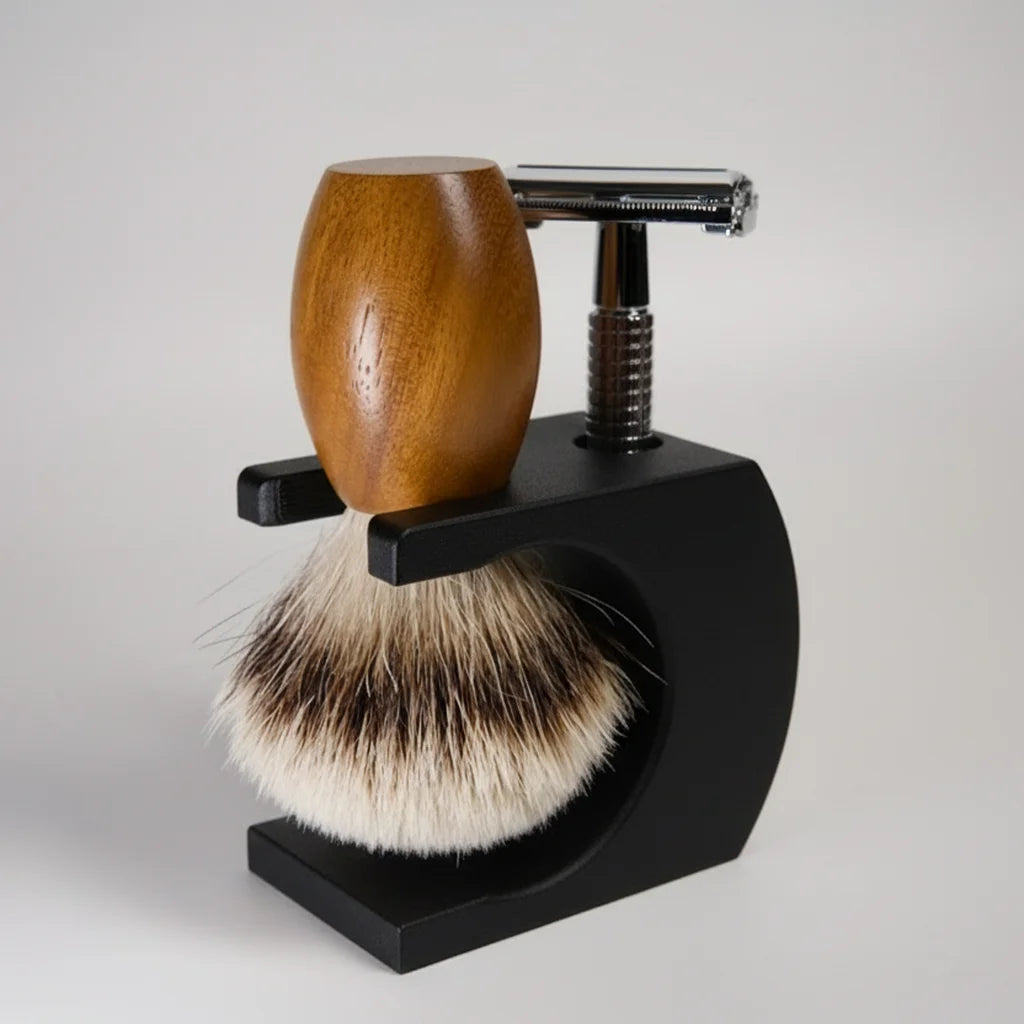 Shaving brush with wooden handle and black stand on a white background