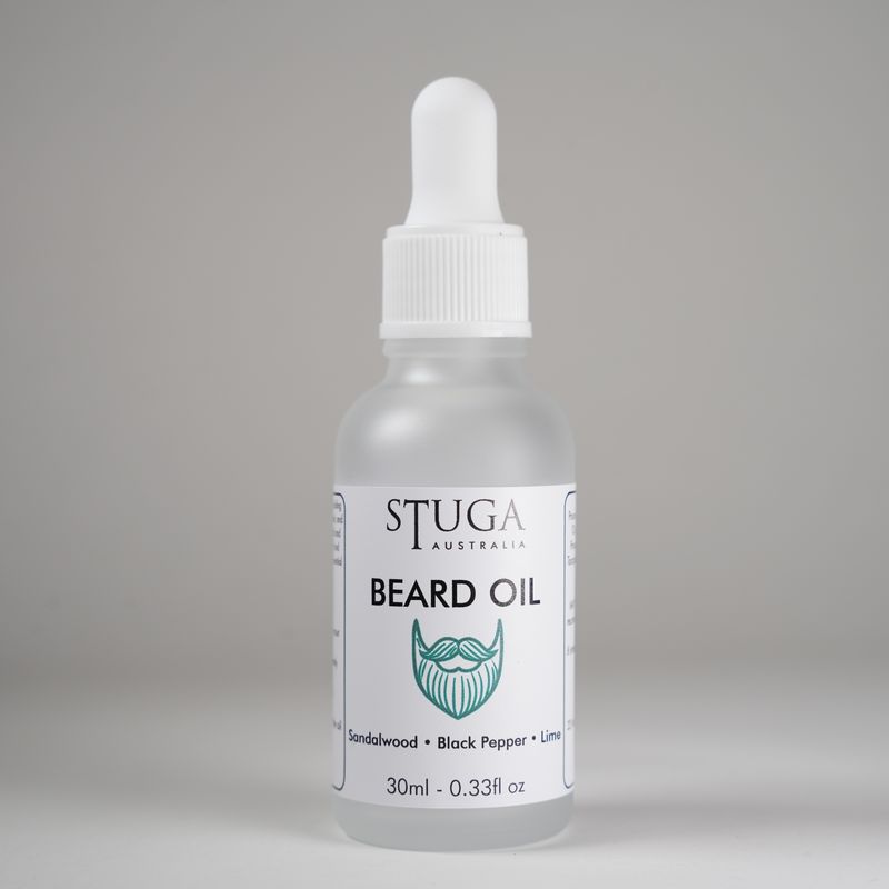30ml Stuga Australia beard oil with sandalwood, black pepper, and lime scent in frosted glass dropper bottle