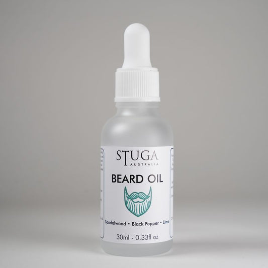 30ml Stuga Australia beard oil with sandalwood, black pepper, and lime scent in frosted glass dropper bottle