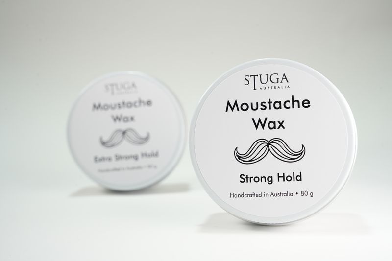 Stuga Australia moustache wax with strong hold, handcrafted, 80 grams, white round container with black text and mustache gra