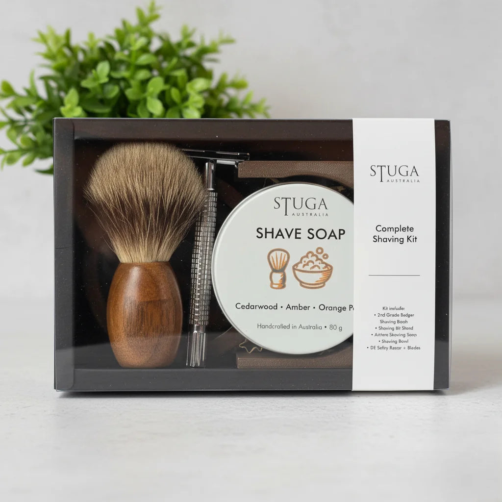 Stuga complete shaving kit with badger brush, safety razor, and cedarwood amber orange peel shave soap.