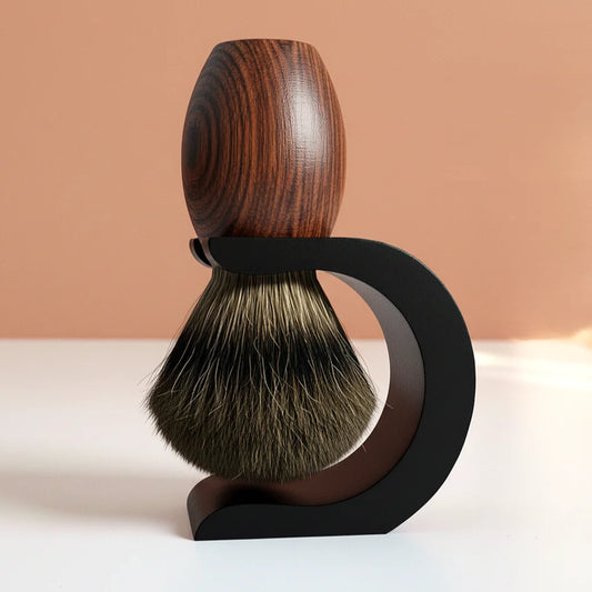 Elegant shaving brush with dark wood handle and badger hair bristles, resting on a sleek black stand.