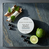 Stuga Beard Styling Balm in Silver Birch, Bergamot and Forest Cassis — 50g white tin on a slate slab with birch bark, fresh birch leaves, blackcurrants and cut bergamot. Natural hold beard balm handcrafted in the Southern Highlands, NSW Australia.