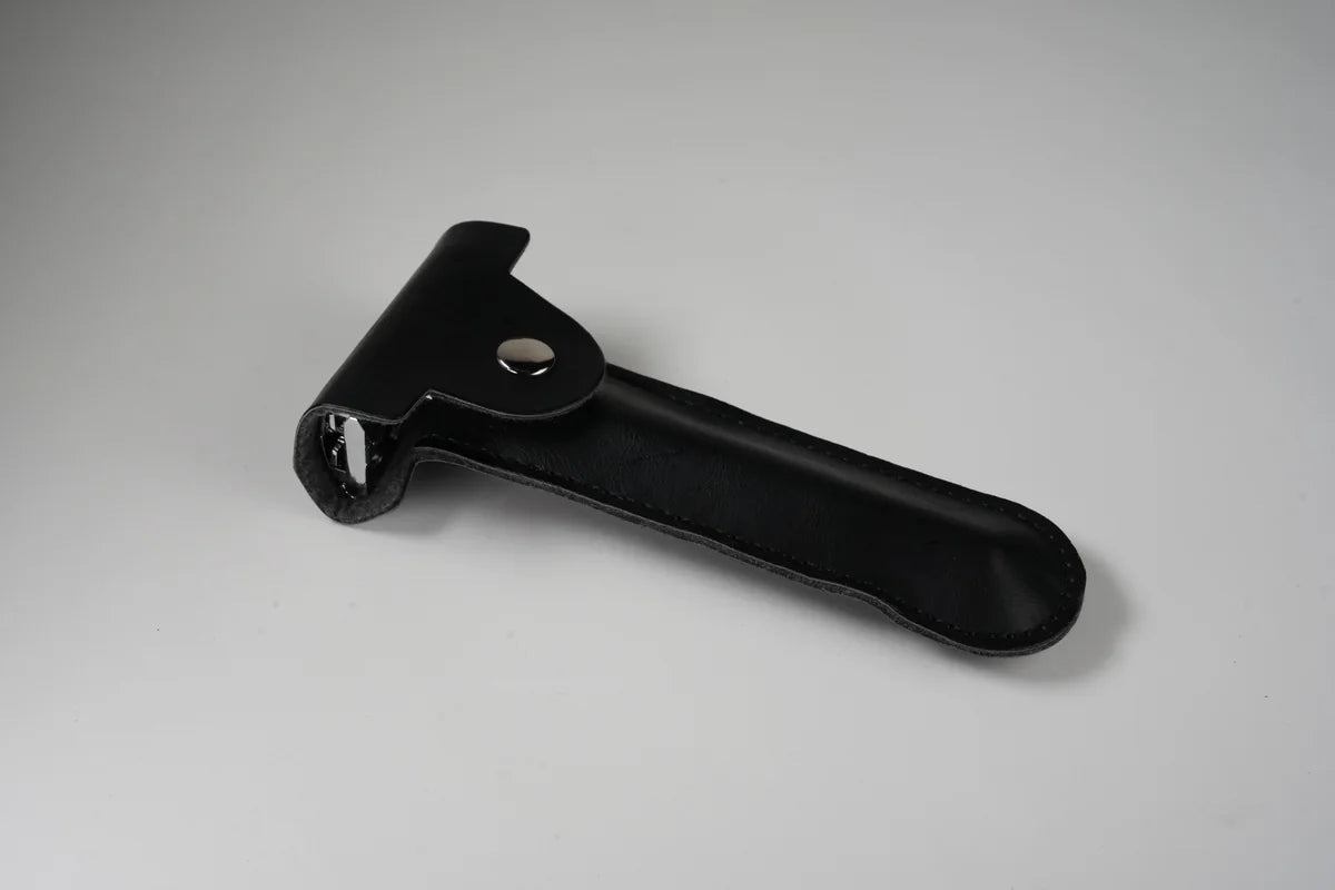 Black leather nail clipper holder with snap button closure for secure storage and easy portability