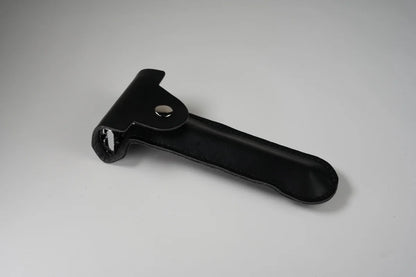Black leather nail clipper holder with snap button closure for secure storage and easy portability