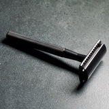 WÖLFE 97 matte black double edge safety razor, full view of the three-piece design.