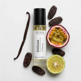 10ml Stuga Vanilla No. 313 oil perfume bottle with vanilla bean, tonka beans, passion fruit, and lime on white background