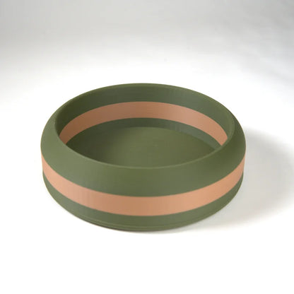 Round green silicone pet bowl with a wide beige stripe around the middle, suitable for feeding dogs or cats