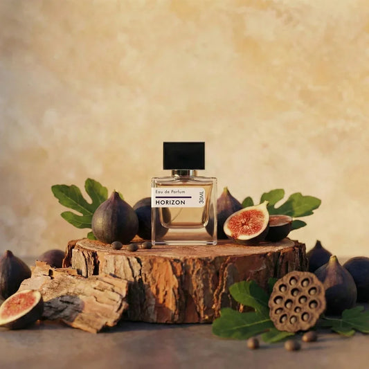 Horizon Eau de Parfum 30ml clear glass bottle with black cap displayed on rustic wood with fresh figs