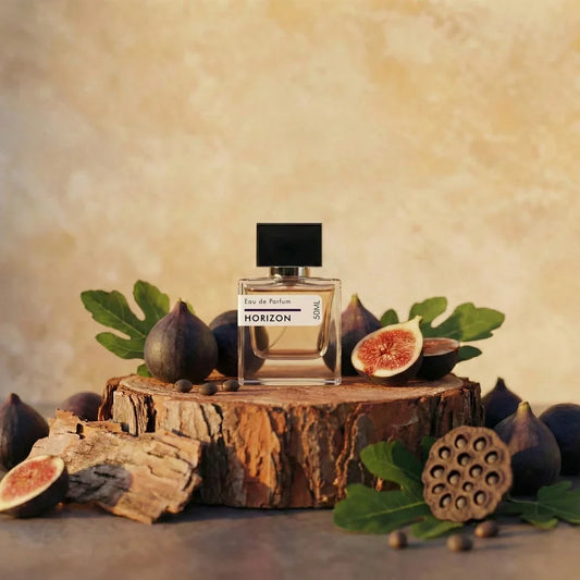 Horizon Eau de Parfum 50ml clear glass bottle with black cap displayed on wood stump surrounded by fresh figs