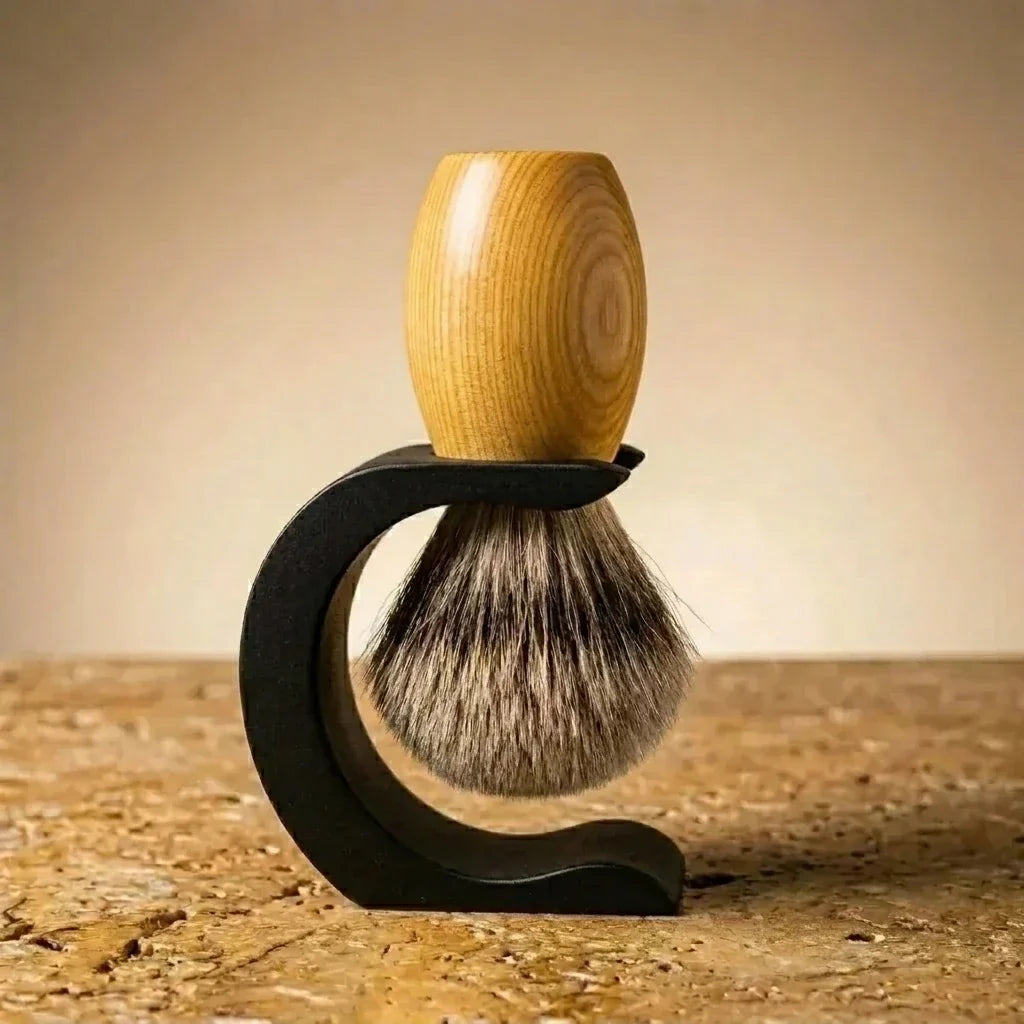 Huon pine handle Premium badger bristle shaving brush on a matte black Wave stand, Australian made by Stuga.