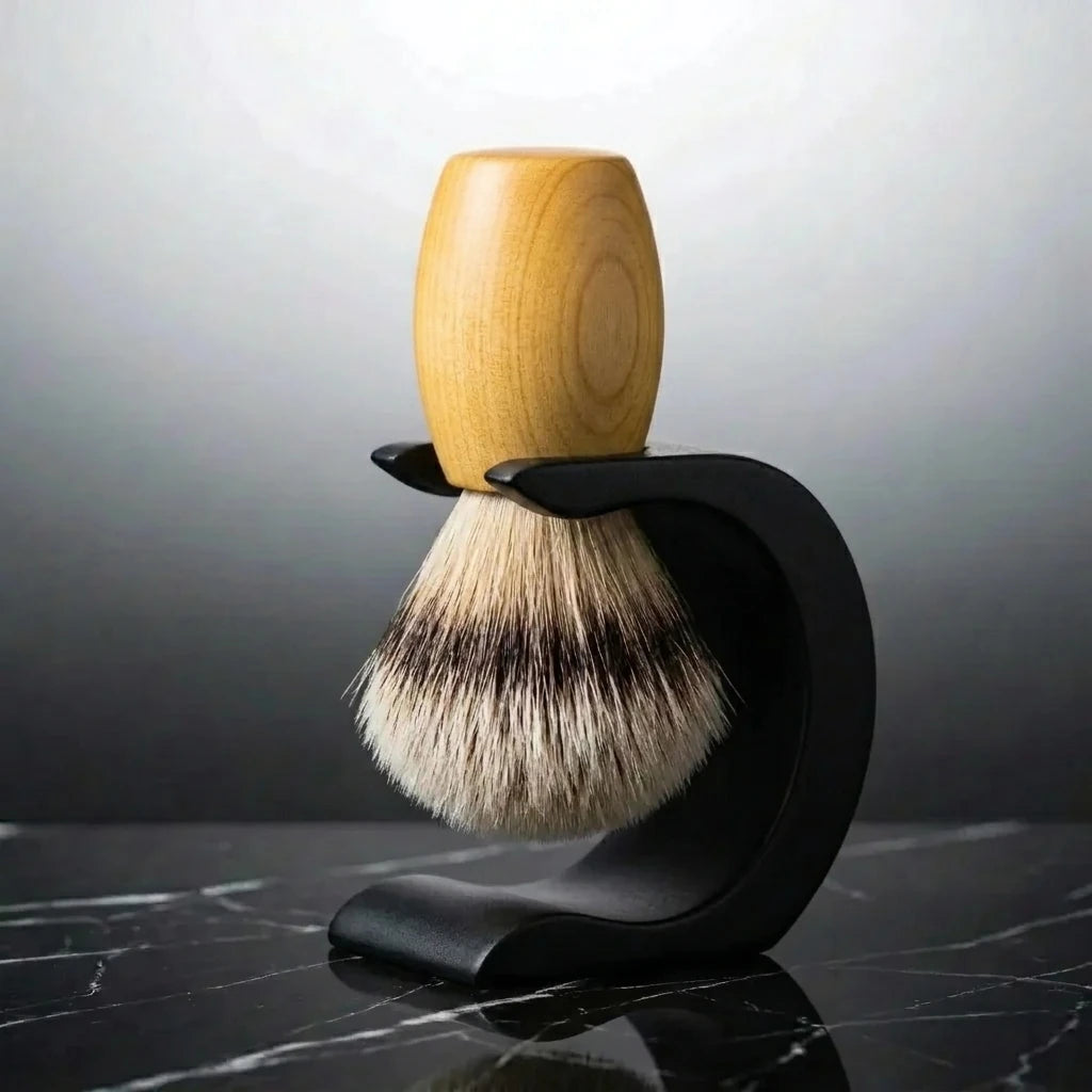 Luxury silver tip badger shaving brush with Huon pine handle on a matte black Wave stand, Australian made by Stuga