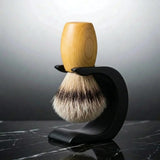 Luxury silver tip badger shaving brush with Huon pine handle on a matte black Wave stand, Australian made by Stuga