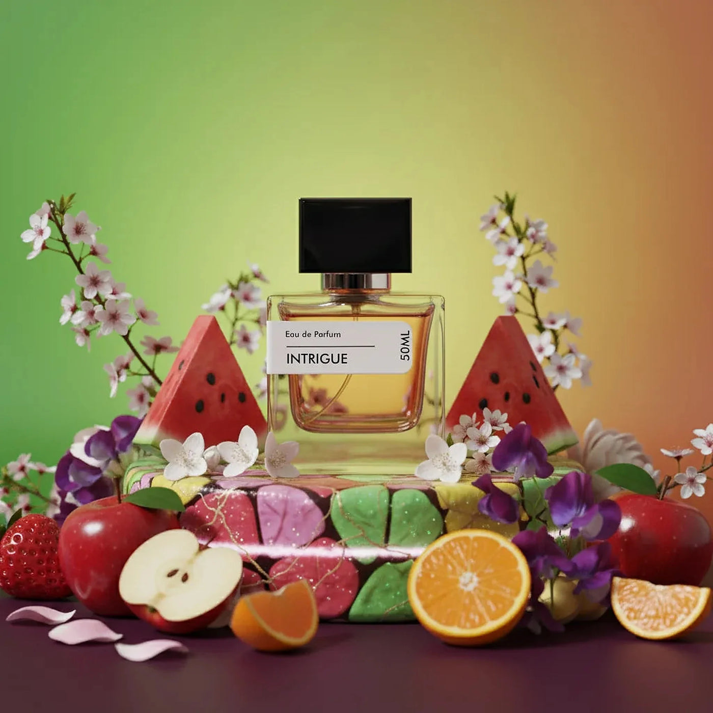 Intrigue Eau de Parfum 50ml bottle surrounded by fresh fruit slices, flowers, and colorful candies.