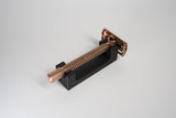 Stuga Razor Rest safety razor stand in matte charcoal, holding a double edge safety razor upright to dry