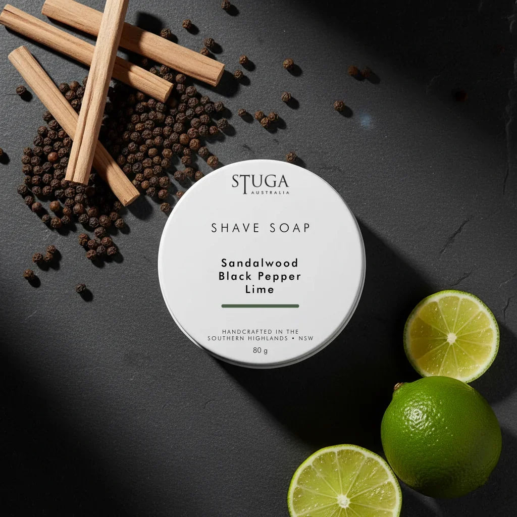 White circular shave soap container with 'STUGA AUSTRALIA' and 'Sandalwood Black Pepper Lime' text.