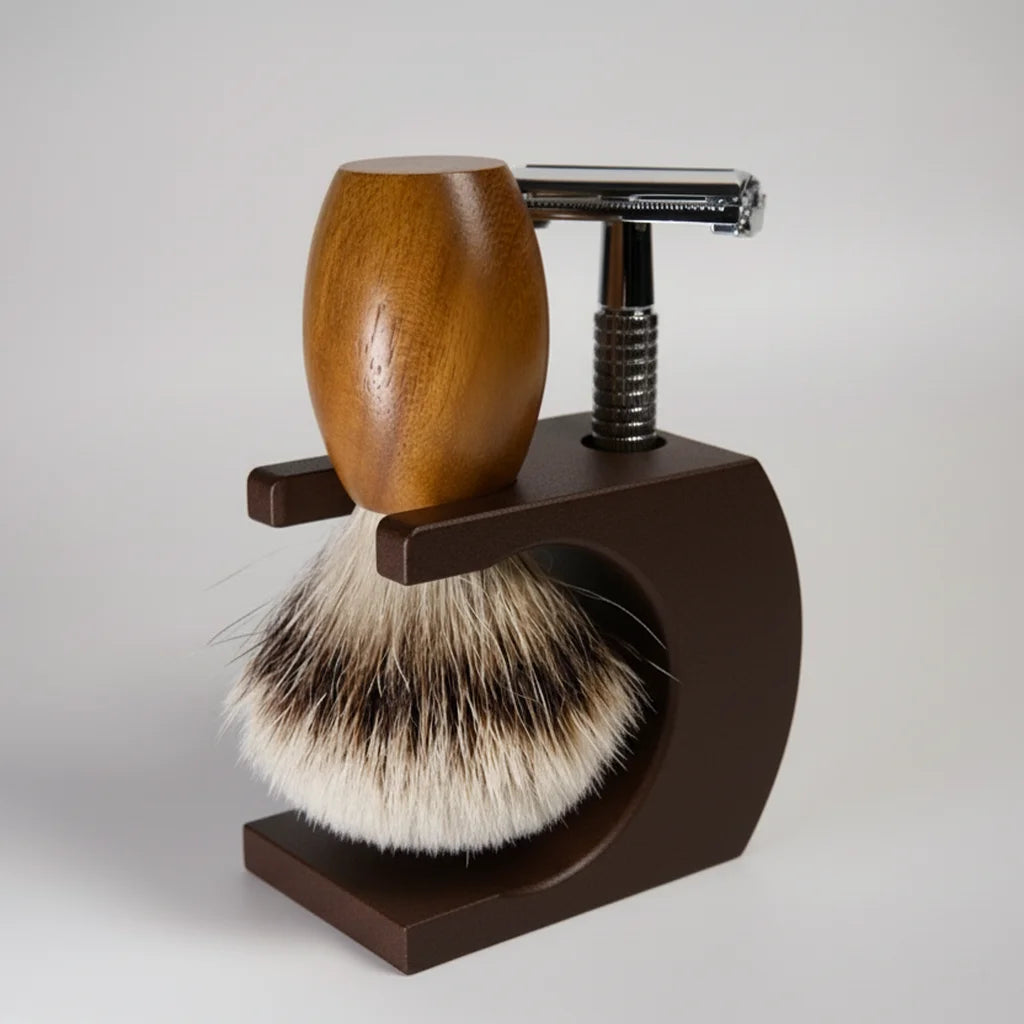 Shaving brush and safety razor on a wooden stand against a white background