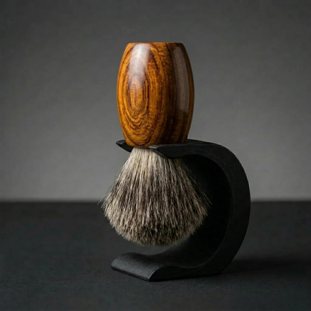 Teak wood handle Essentials badger bristle shaving brush on a matte black Wave stand, Australian made by Stuga.