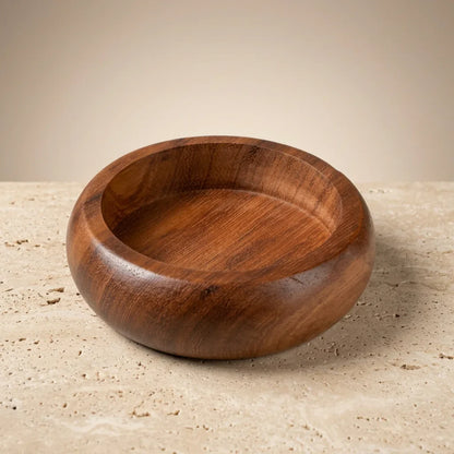 Handturned teak wood shaving bowl by Stuga — rich golden-brown grain with natural oil finish
