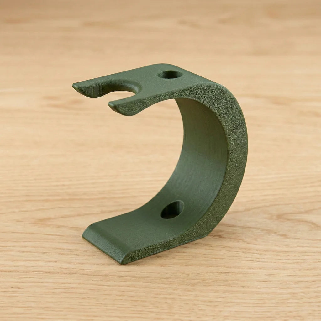 Olive green curved Wave XL shaving kit stand with textured finish, razor and brush holder notches on top