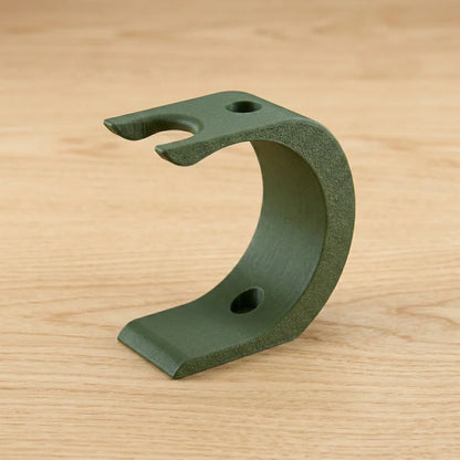 Olive green curved Wave XL shaving kit stand with textured finish, razor and brush holder notches on top