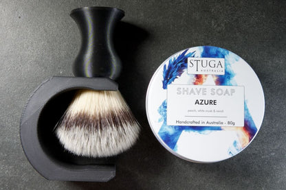 Image of The Essentials Shaving Kit by Stuga, featuring a handcrafted brush, soap, and stand made from sustainable materials.