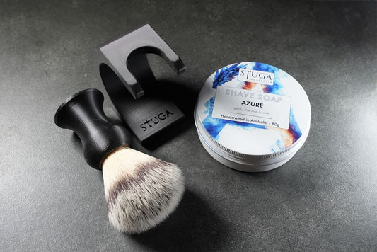 Alt text: "The Essentials Shaving Kit by Stuga: handcrafted brush, soap, and stand, showcasing natural, sustainable design."